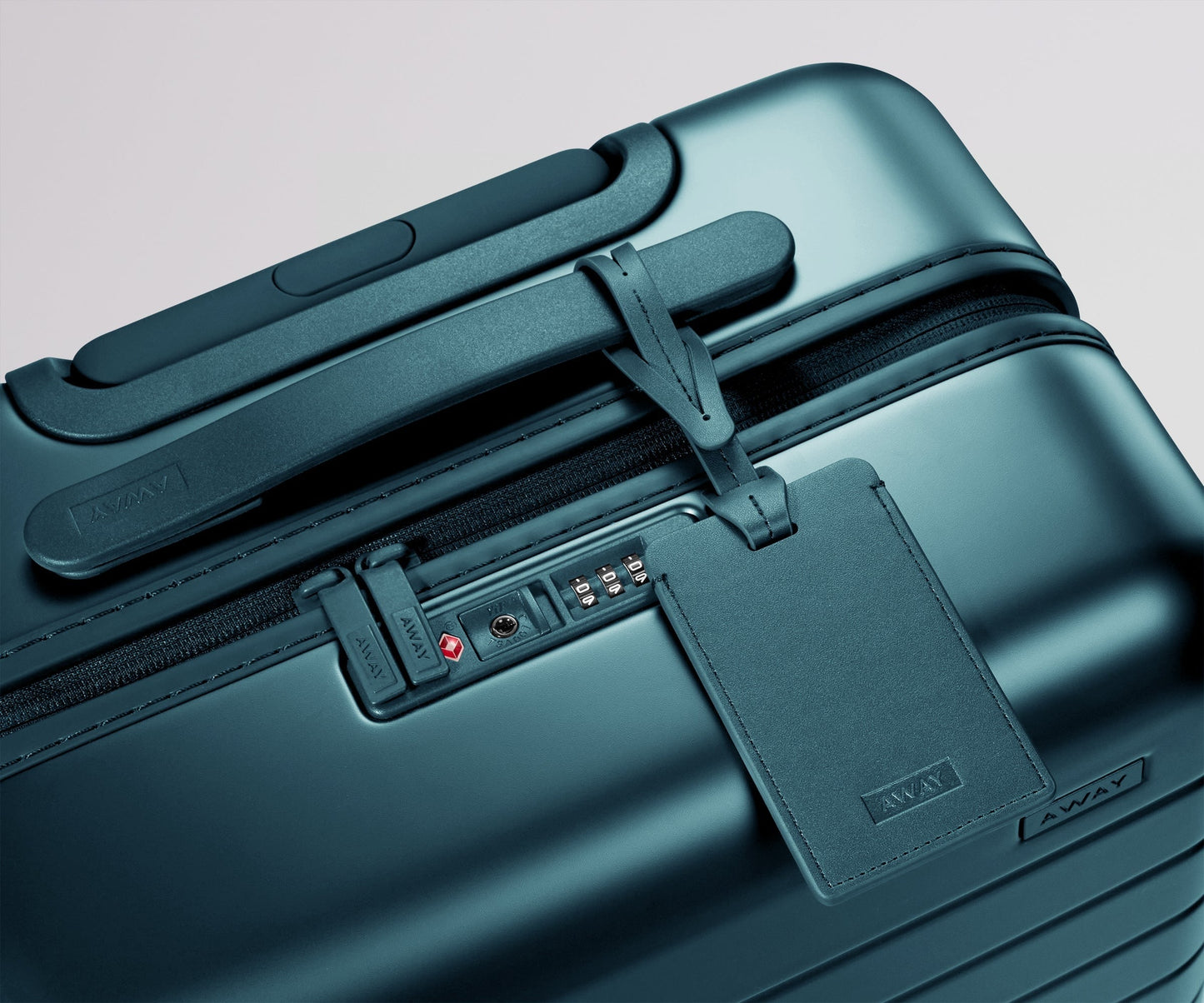 The Bigger Carry-On in Stormy Teal