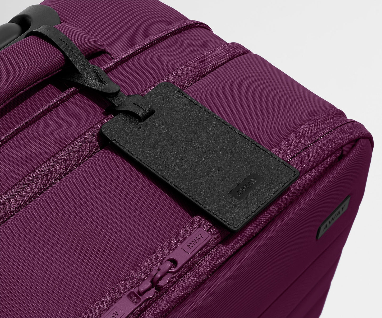 Softside Bigger Carry-On in Plum Purple