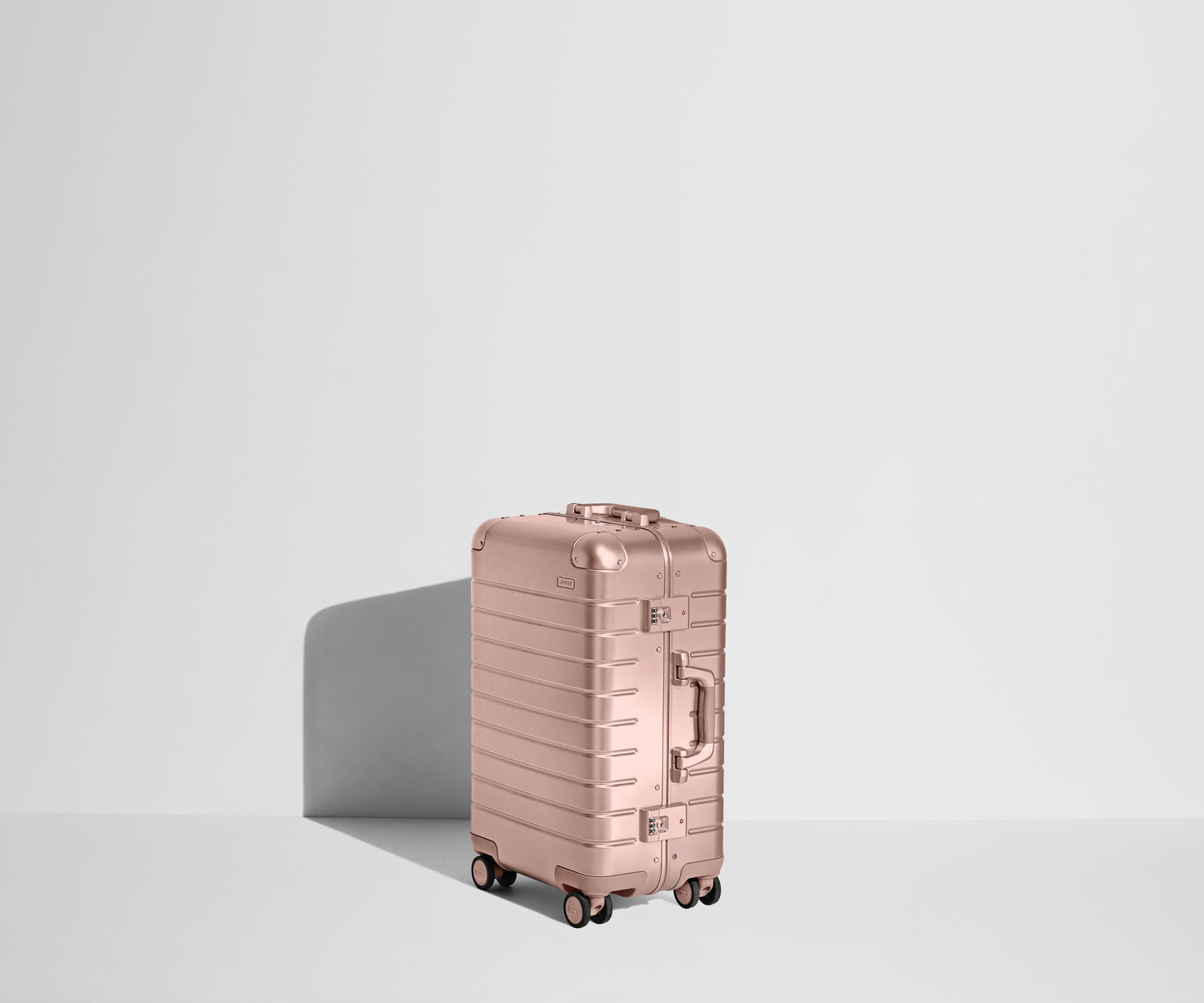 The Bigger Carry-On: Aluminum Edition in Rose Gold (with USB charger)